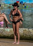 craig brunton add kate mckinnon bikini photo