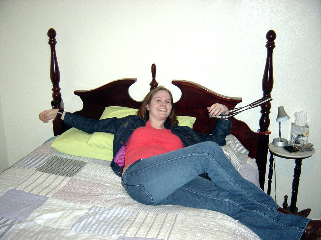 andy helwig add woman tied to bed image