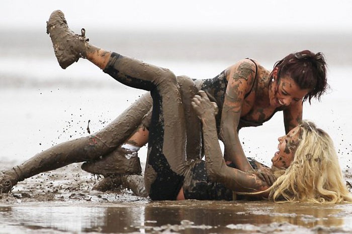 chris sayer add naked mud fight photo