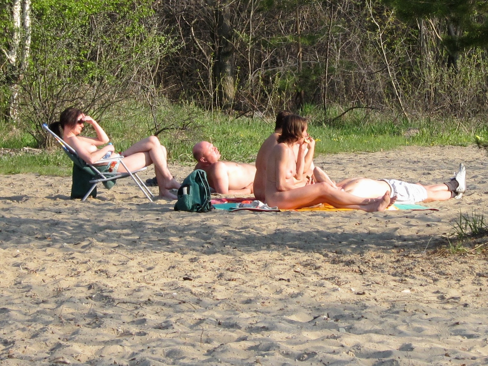 amro hasan add nude people on a beach image